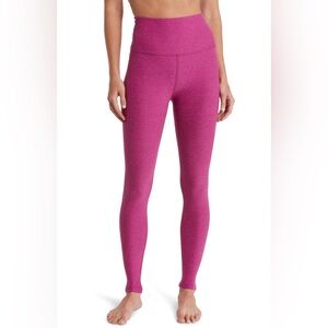 Beyond Yoga caught in the midi leggings in magenta heather